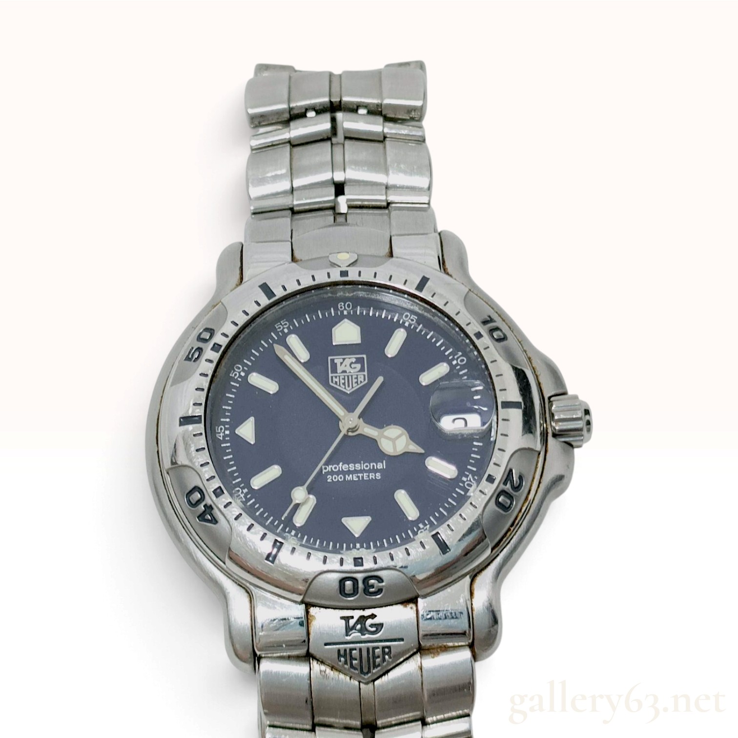 TAG Heuer 994.713K Stainless steel Champagne | Dealer | EveryWatch
